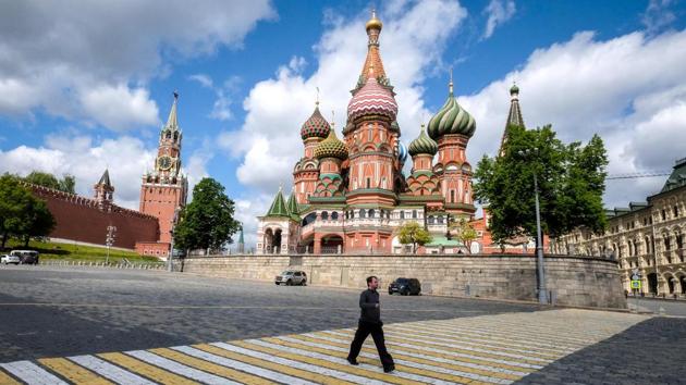A man walks in front of Saint Basil’s Cathedral in Moscow on May 17 during a strict lockdown in Russia to stop the spread of the novel coronavirus COVID-19. Russia reported its highest ever daily coronavirus death toll of 135 on May 20, bringing the country’s total fatalities to nearly 3,000 with 308,705 cases recorded. (Yui Kadobnov / AFP)