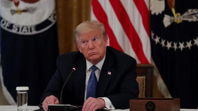 US President Donald Trump participates in a Cabinet meeting on the administration's coronavirus disease outbreak response in the East Room at the White House in Washington. (Reuters File Photo) US President Donald Trump participates in a Cabinet meeting on the administration's coronavirus disease outbreak response in the East Room at the White House in Washington. (Reuters File Photo)