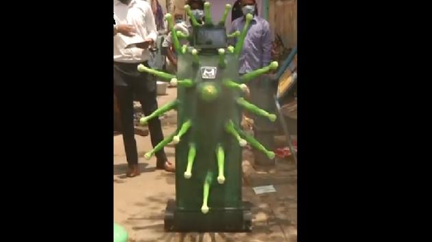 These robots were carried by a three-wheeler auto which was also based on corona theme.(ANI)