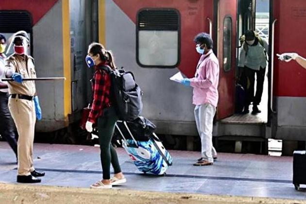 The passengers were allowed to board the trains with face masks while ensuring social distancing and other precautions. (ANI) The passengers were allowed to board the trains with face masks while ensuring social distancing and other precautions. (ANI)