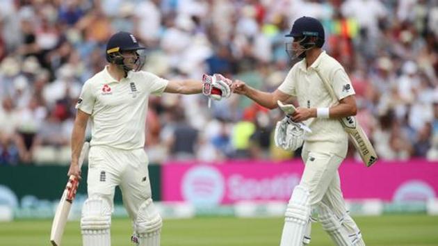 England's Chris Woakes and Stuart Broad during the match.(Action Images via Reuters)