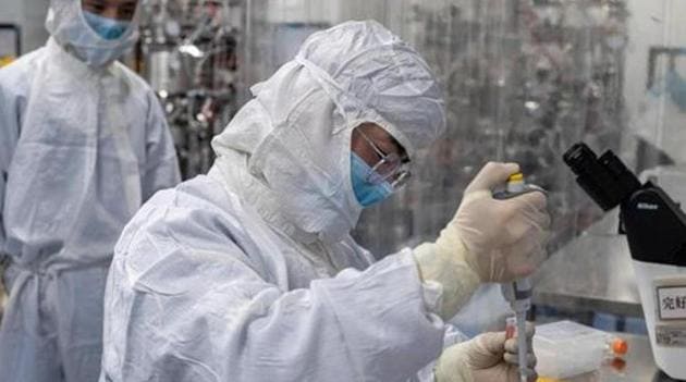(FILES) This file photo taken on April 29, 2020 shows an engineer taking samples of monkey kidney cells as he make tests on an experimental vaccine for the COVID-19 coronavirus inside the Cells Culture Room laboratory at the Sinovac Biotech facilities in Beijing/ representative. (AFP) (FILES) This file photo taken on April 29, 2020 shows an engineer taking samples of monkey kidney cells as he make tests on an experimental vaccine for the COVID-19 coronavirus inside the Cells Culture Room laboratory at the Sinovac Biotech facilities in Beijing/ representative. (AFP)