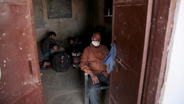 Migrant workers from Bihar waiting in a ramshackle room for a bus to take them back from a temporary shelter home at Kanota on Agra highway, in Jaipur, Rajasthan, India on Wednesday, May 20, 2020. (Photo by Himanshu Vyas/ Hindustan Times) Migrant workers from Bihar waiting in a ramshackle room for a bus to take them back from a temporary shelter home at Kanota on Agra highway, in Jaipur, Rajasthan, India on Wednesday, May 20, 2020. (Photo by Himanshu Vyas/ Hindustan Times)