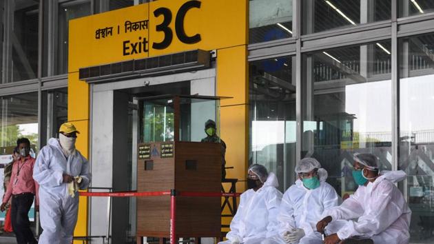 Medical workers in PPE suits seen at Netaji Subhash Chandra Bose International Airport in Kolkata, West Bengal.(Samir Jana / Hindustan Times)