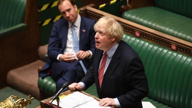 Britain's Prime Minister Boris Johnson speaks at the House of Commons during question period amid the coronavirus disease outbreak in London.(UK Parliament via Reuters)