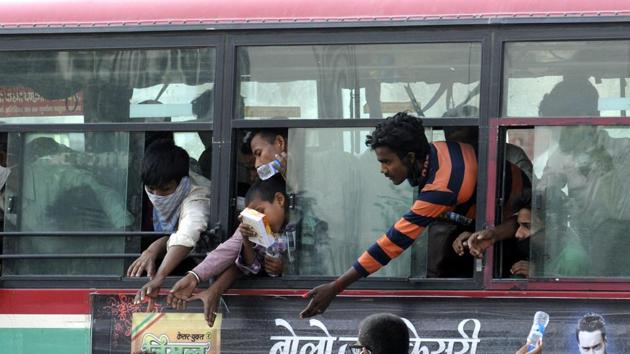 An additional 12,000 UPSRTC buses and private buses had been hired to ferry the migrants in all the districts. (Dheeraj Dhawan/HT Photo) An additional 12,000 UPSRTC buses and private buses had been hired to ferry the migrants in all the districts. (Dheeraj Dhawan/HT Photo)