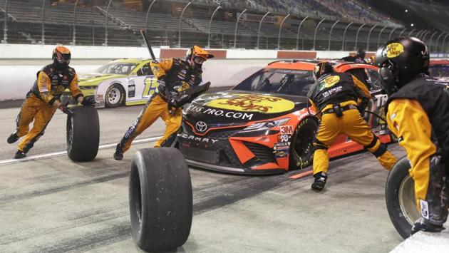 Martin Truex Jr. makes a pit stop during the NASCAR Cup Series. (AP)