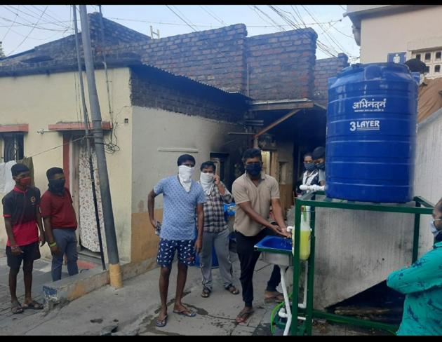 People use sanitiser dispensers at Sahakaranagar. (HT PHOTO) People use sanitiser dispensers at Sahakaranagar. (HT PHOTO)