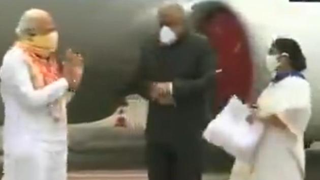 Prime Minister Narendra Modi being received by West Bengal Governor Jagdeep Dhankar and Chief Minister Mamata Banerjee at Kolkata airport on Friday. (ANI Photo) Prime Minister Narendra Modi being received by West Bengal Governor Jagdeep Dhankar and Chief Minister Mamata Banerjee at Kolkata airport on Friday. (ANI Photo)