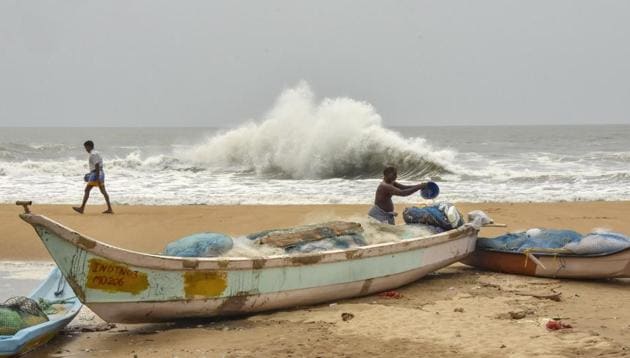 Fishermen work at a beach in the backdrop of a rough sea due to Cyclone Amphan, at Mamallapuram in Chengalpattu district, Monday, May 18, 2020/ representative. (PTI) Fishermen work at a beach in the backdrop of a rough sea due to Cyclone Amphan, at Mamallapuram in Chengalpattu district, Monday, May 18, 2020/ representative. (PTI)