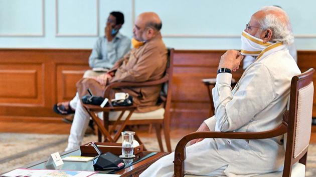 Prime Minister Narendra Modi during a meeting with Ministry of Home Affairs and National Disaster Management Authority, to review the situation arising due to cyclone 'Amphan', on May 18. (PTI Photo) Prime Minister Narendra Modi during a meeting with Ministry of Home Affairs and National Disaster Management Authority, to review the situation arising due to cyclone 'Amphan', on May 18. (PTI Photo)