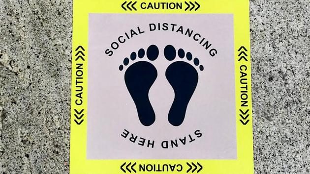 A sticker is glued on the floor of Chennai airport for proper adherence of social distancing. According to data by Directorate General of Civil Aviation (DGCA), flights in the first phase will operate on all routes, taking off from a total of 35 origin cities and landing in 39 destination airports, reported HT. (PTI) 