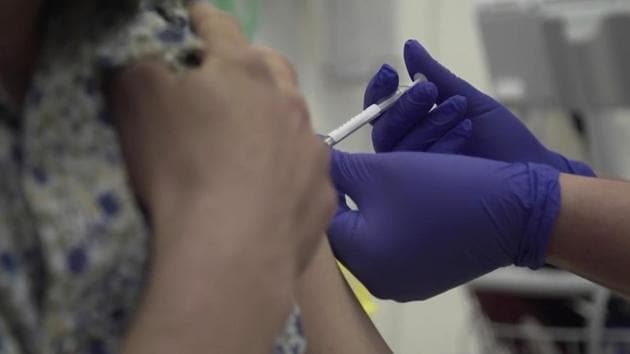 Screen grab taken from video issued by Britain's Oxford University, showing a person being injected as part of the first human trials in the UK to test a potential coronavirus vaccine, untaken by Oxford University, England. (AP) Screen grab taken from video issued by Britain's Oxford University, showing a person being injected as part of the first human trials in the UK to test a potential coronavirus vaccine, untaken by Oxford University, England. (AP)