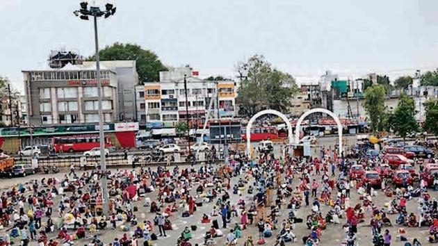 Migrants wait for a train in Bhopal on May 16. (ANI) Migrants wait for a train in Bhopal on May 16. (ANI)