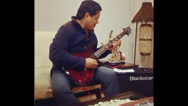 The image shows Meghalaya CM Conrad Sangma playing his guitar. (Instagram/conrad_k_sangma) The image shows Meghalaya CM Conrad Sangma playing his guitar. (Instagram/conrad_k_sangma)