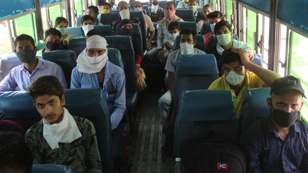 Migrants on board Haryana Roadways buses that will take them home to Uttar Pradesh, from the Govt Girls College Sector 14, in Gurugram, India, on Friday, May 22, 2020. (Yogendra Kumar/HT PHOTO) Migrants on board Haryana Roadways buses that will take them home to Uttar Pradesh, from the Govt Girls College Sector 14, in Gurugram, India, on Friday, May 22, 2020. (Yogendra Kumar/HT PHOTO)