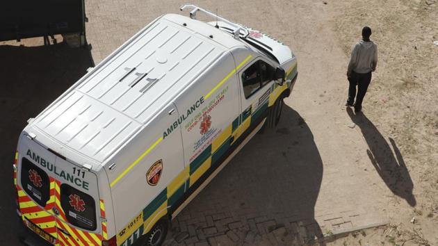 An ambulance passes a pedestrian in Khayelitsha, Cape Town. Africa’s worst-case scenario, according to published models, would see more than 3 million infected with more than 300,000 deaths and “that would be overwhelming for sure,” Africa CDC director John Nkengasong told AP. But he warned that “models are only as good as the assumptions we put in there.” (Nardus Engelbrecht / AP) An ambulance passes a pedestrian in Khayelitsha, Cape Town. Africa’s worst-case scenario, according to published models, would see more than 3 million infected with more than 300,000 deaths and “that would be overwhelming for sure,” Africa CDC director John Nkengasong told AP. But he warned that “models are only as good as the assumptions we put in there.” (Nardus Engelbrecht / AP)