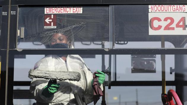 A bus is sanitised after the morning peak period in Cape Town on May 22. Testing in Africa remains low. The Africa CDC has said that the continent needs to increase testing about 10-fold and should strive to test at least 1% of thMe population, or 13 million people. So far about 1.5 million tests have been conducted. South Africa has been testing assertively and leads the continent with more than 20,000 cases. (Nardus Engelbrecht / AP) A bus is sanitised after the morning peak period in Cape Town on May 22. Testing in Africa remains low. The Africa CDC has said that the continent needs to increase testing about 10-fold and should strive to test at least 1% of thMe population, or 13 million people. So far about 1.5 million tests have been conducted. South Africa has been testing assertively and leads the continent with more than 20,000 cases. (Nardus Engelbrecht / AP)