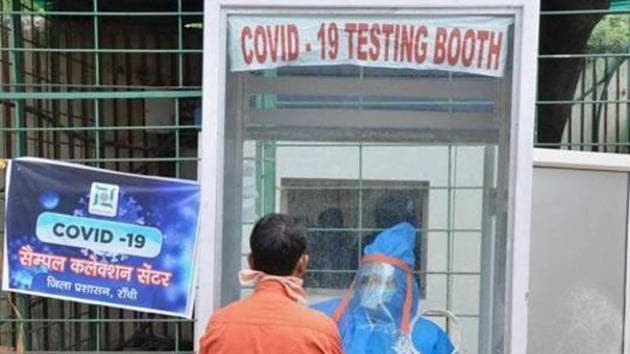 A health worker takes samples for a swab test, during the nationwide lockdown to curb the spread of coronavirus, at a school in Ranchi, Friday, April 24, 2020. (PTI)