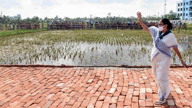 West Bengal Chief Minister Mamata Banerjee waves at the villagers during her meeting for Cyclone Amphan, on May 23. The home department of the Government of West Bengal circulated in a tweet that they had also reached out to the railways, port authorities and the private sector to join the gigantic restoration task ahead. (PTI) West Bengal Chief Minister Mamata Banerjee waves at the villagers during her meeting for Cyclone Amphan, on May 23. The home department of the Government of West Bengal circulated in a tweet that they had also reached out to the railways, port authorities and the private sector to join the gigantic restoration task ahead. (PTI)