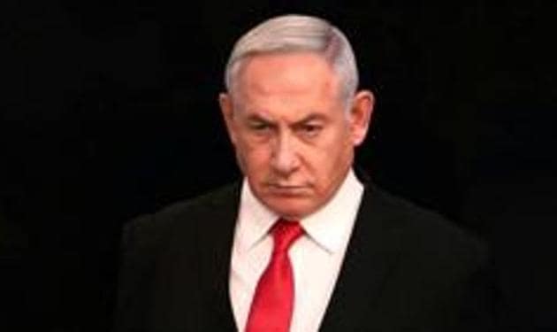FILE: Israeli Prime Minister Benjamin Netanyahu arrives for a speech at his Jerusalem office, regarding the new measures that will be taken to fight the coronavirus, March 14, 2020. (REUTERS) FILE: Israeli Prime Minister Benjamin Netanyahu arrives for a speech at his Jerusalem office, regarding the new measures that will be taken to fight the coronavirus, March 14, 2020. (REUTERS)