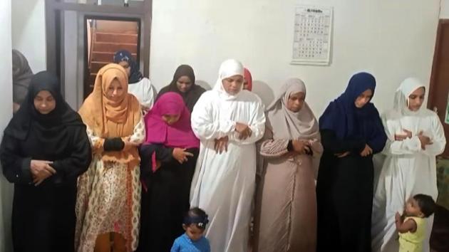 Kerala, May 24 (ANI): Women offer Eid-Ul-Fitr prayers at their home as mosques remain closed for devotees, amid COVID19 lockdown, in Malapurram on Sunday. (ANI Photo)(ANI)