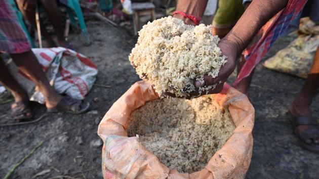 A man shows a sack of rice spoilt due to Cyclone Amphan. “Food Corporation of India (FCI) will also ensure adequate availability of food grains, especially rice, to West Bengal so that marooned people are provided immediate sustenance”, the Chief Secretary of West Bengal issued in a statement. (Samir Jana / HT Photo) A man shows a sack of rice spoilt due to Cyclone Amphan. “Food Corporation of India (FCI) will also ensure adequate availability of food grains, especially rice, to West Bengal so that marooned people are provided immediate sustenance”, the Chief Secretary of West Bengal issued in a statement. (Samir Jana / HT Photo)