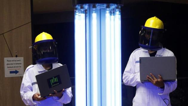 An autonomous mobile robot that disinfects surfaces with ultraviolet light, known as Sunburst UV Bot, is deployed at Northpoint City shopping mall amid the coronavirus disease (COVID-19) outbreak in Singapore May 20, 2020.(REUTERS)