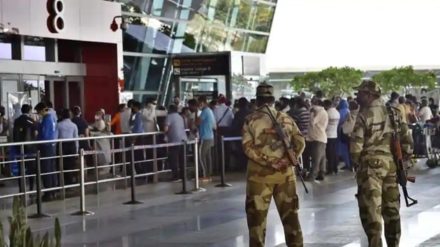CISF security personnel at T3 Indira Gandhi International (IGI) Airport, in New Delhi on Sunday. The flight services are resuming from Monday after an order by the central government. (Ajay Aggarwal/HT Photo) CISF security personnel at T3 Indira Gandhi International (IGI) Airport, in New Delhi on Sunday. The flight services are resuming from Monday after an order by the central government. (Ajay Aggarwal/HT Photo)