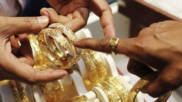 Gold on Friday rose as much as 0.8% to touch $1,739.51, before paring gains.(Reuters File Photo)