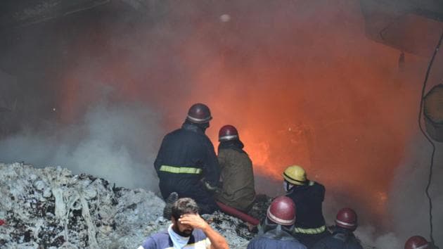 As many as 14 fire tenders were deployed at the spot with over 60 fire fighters working to douse the flames. (HT File Photo) As many as 14 fire tenders were deployed at the spot with over 60 fire fighters working to douse the flames. (HT File Photo)