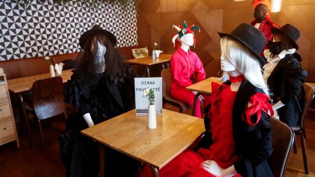 Mannequins dressed in creations of local designer sit at the table in a restaurant during the coronavirus disease (COVID-19) outbreak in Vilnius, Lithuania May 21, 2020. REUTERS/Ints Kalnins(REUTERS) Mannequins dressed in creations of local designer sit at the table in a restaurant during the coronavirus disease (COVID-19) outbreak in Vilnius, Lithuania May 21, 2020. REUTERS/Ints Kalnins(REUTERS)