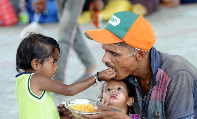 Many children at the camp appeared tired and listless while infants cried as their parents frantically tried to keep them cool with hand fans fashioned out of cardboard and plastic.(Representative Image (Bharat Bhushan/HT))