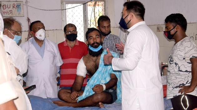 Rashtriya Janata Dal leader Tejashwi Yadav meeting party leader JP Chaudhary admitted at PMCH (ANI Photo) Rashtriya Janata Dal leader Tejashwi Yadav meeting party leader JP Chaudhary admitted at PMCH (ANI Photo)