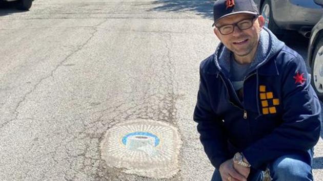 Art in times of Coronavirus: Artist fills pesky potholes with ...