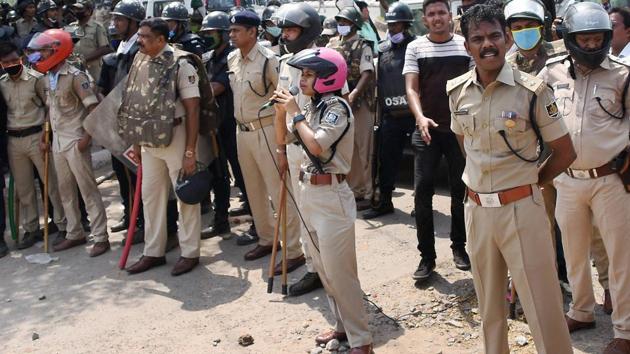 Residents in a containment zone in Odisha’s Rourkela threw stones at the policemen demanding lifting of the containment order from their locality. (PTI Photo) Residents in a containment zone in Odisha’s Rourkela threw stones at the policemen demanding lifting of the containment order from their locality. (PTI Photo)