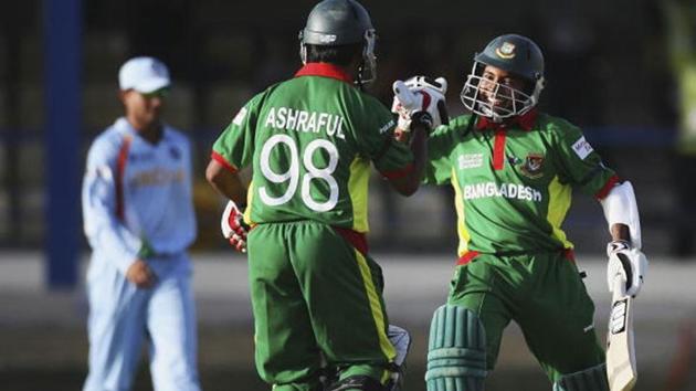 Mushfiqur Rahim with Mohammad Ashraful after scoring the winning runs for Bangladesh(Getty Images)