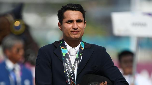 India's silver medallist Fouaad Mirza takes part in the awards ceremony for the eventing individual event at the equestrian competition at the 2018 Asian Games in Jakarta. (Photo by Arief Bagus / AFP)(AFP)