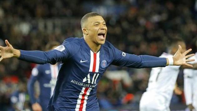 PSG's Kylian Mbappe celebrates after scoring his side's fourth goal during the French League One soccer match between Paris-Saint-Germain and Dijon.(AP)