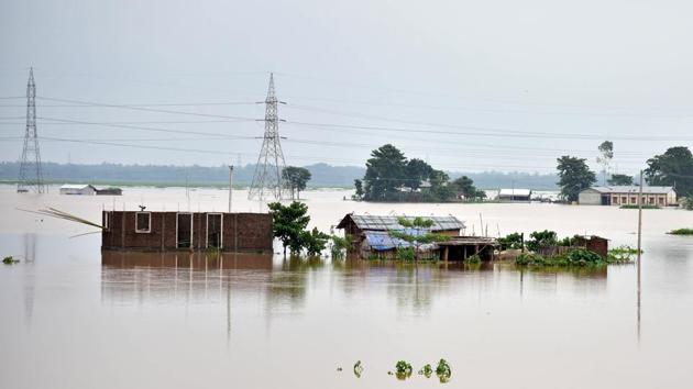 Houses seen submerged in flood water due to heavy rainfall at Bolbola on May 25. Most rivers in the state continue to remain in spate with the Jia Bharali and Brahmaputra flowing above the danger mark in Sonitpur and Nematighat (Jorhat), respectively. (ANI)