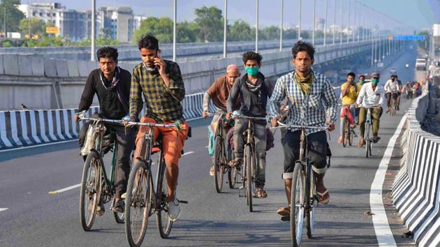 Migrant workers from Raipur (Chhattisgarh) ride bicycles to reach their native places, during a nationwide lockdown in the wake of coronavirus pandemic, in Patna. (PTI) Migrant workers from Raipur (Chhattisgarh) ride bicycles to reach their native places, during a nationwide lockdown in the wake of coronavirus pandemic, in Patna. (PTI)