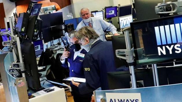 The reopening comes in contrast to other major financial firms, including lenders and credit card companies, which have been more cautious, with most US staff working remotely. (Reuters photo) The reopening comes in contrast to other major financial firms, including lenders and credit card companies, which have been more cautious, with most US staff working remotely. (Reuters photo)