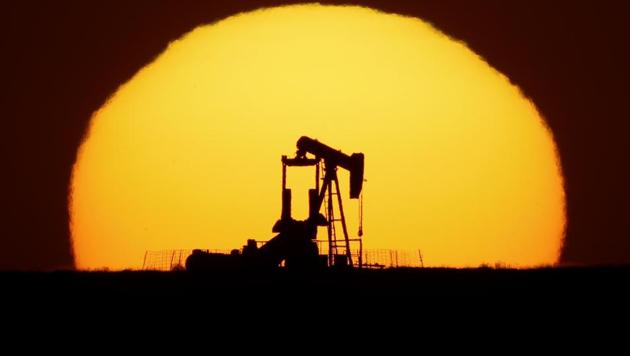 US oil output will reach a low point of about 10.7 million barrels a day in June, which would be the lowest in two years, according to Rystad Energy. (AP Photo. Representative image) US oil output will reach a low point of about 10.7 million barrels a day in June, which would be the lowest in two years, according to Rystad Energy. (AP Photo. Representative image)