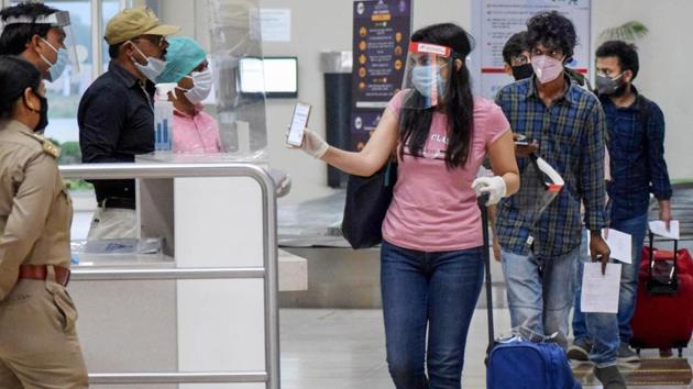 Passengers check out from the airport in Prayagraj, Tuesday, May 26, 2020, a day after resumption of the domestic flight services. (PTI) Passengers check out from the airport in Prayagraj, Tuesday, May 26, 2020, a day after resumption of the domestic flight services. (PTI)