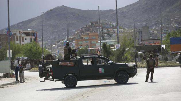 Afghan security forces inspect the site of a bomb explosion in Kabul, Afghanistan. (PTI) Afghan security forces inspect the site of a bomb explosion in Kabul, Afghanistan. (PTI)