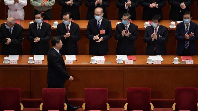 Chinese President Xi Jinping is applauded as he arrives for the closing session of the National People's Congress at the Great Hall of the People in Beijing on May 28, 2020. (AFP photo) Chinese President Xi Jinping is applauded as he arrives for the closing session of the National People's Congress at the Great Hall of the People in Beijing on May 28, 2020. (AFP photo)