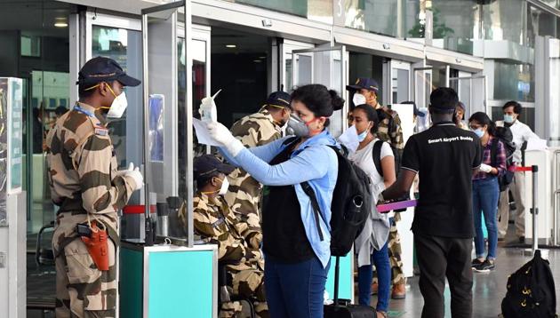 Passengers arrive at Kempe Gowda International Airport following the resumption of domestic flight services during the ongoing Covid-19 lockdown in Bengaluru on Monday. (ANI Photo) Passengers arrive at Kempe Gowda International Airport following the resumption of domestic flight services during the ongoing Covid-19 lockdown in Bengaluru on Monday. (ANI Photo)