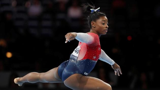 Artistic Gymnastics - 2019 World Artistic Gymnastics Championships - Women's Team Final - Floor - Hanns-Martin-Schleyer-Halle, Stuttgart, Germany - October 8, 2019 Simone Biles of the U.S. in action(REUTERS) Artistic Gymnastics - 2019 World Artistic Gymnastics Championships - Women's Team Final - Floor - Hanns-Martin-Schleyer-Halle, Stuttgart, Germany - October 8, 2019 Simone Biles of the U.S. in action(REUTERS)