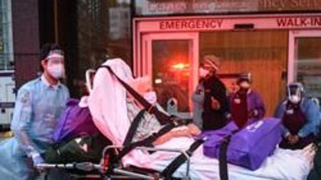 An older man is wheeled towards an ambulance on April 30, 2020 in New York City.(AFP File) An older man is wheeled towards an ambulance on April 30, 2020 in New York City.(AFP File)