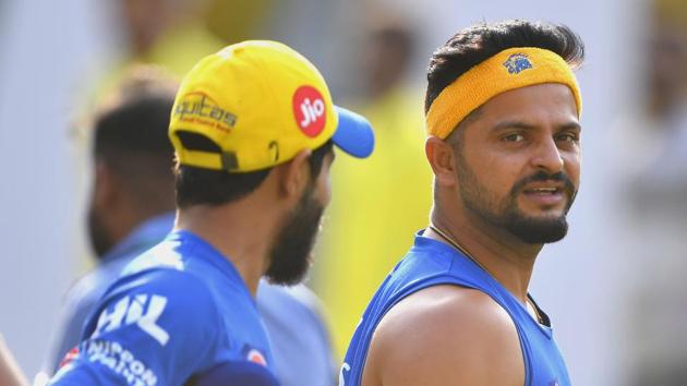 Chennai Super Kings cricketer Ravindra Jadeja (L) and Suresh Raina(AFP)